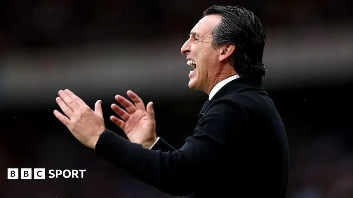 Manager celebrating and applauding during match