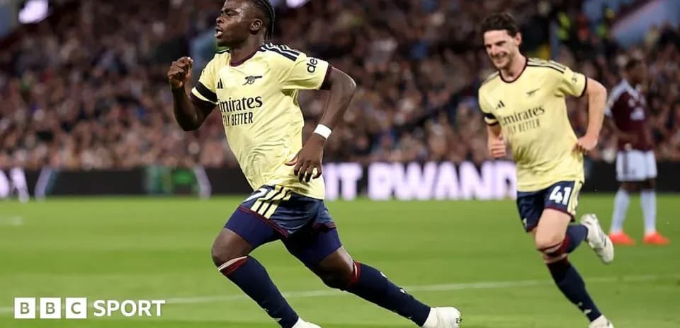 Arsenal players celebrating a goal during match