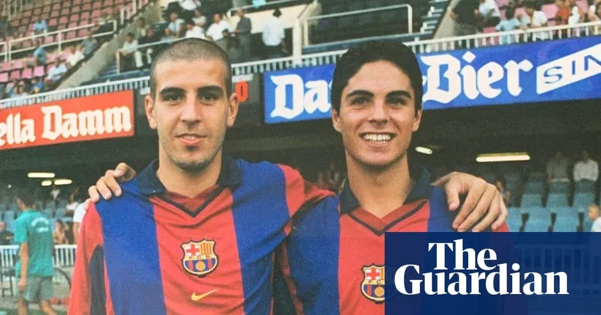 Two young players posing in FC Barcelona jerseys