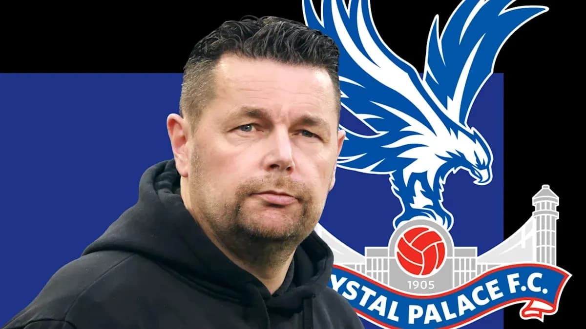 Man in hoodie with Crystal Palace FC logo backdrop