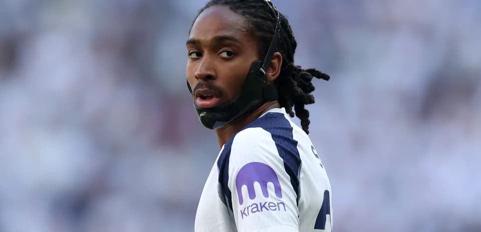 Player wearing mask during a football match