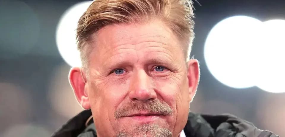 Close-up portrait of a man with blond hair