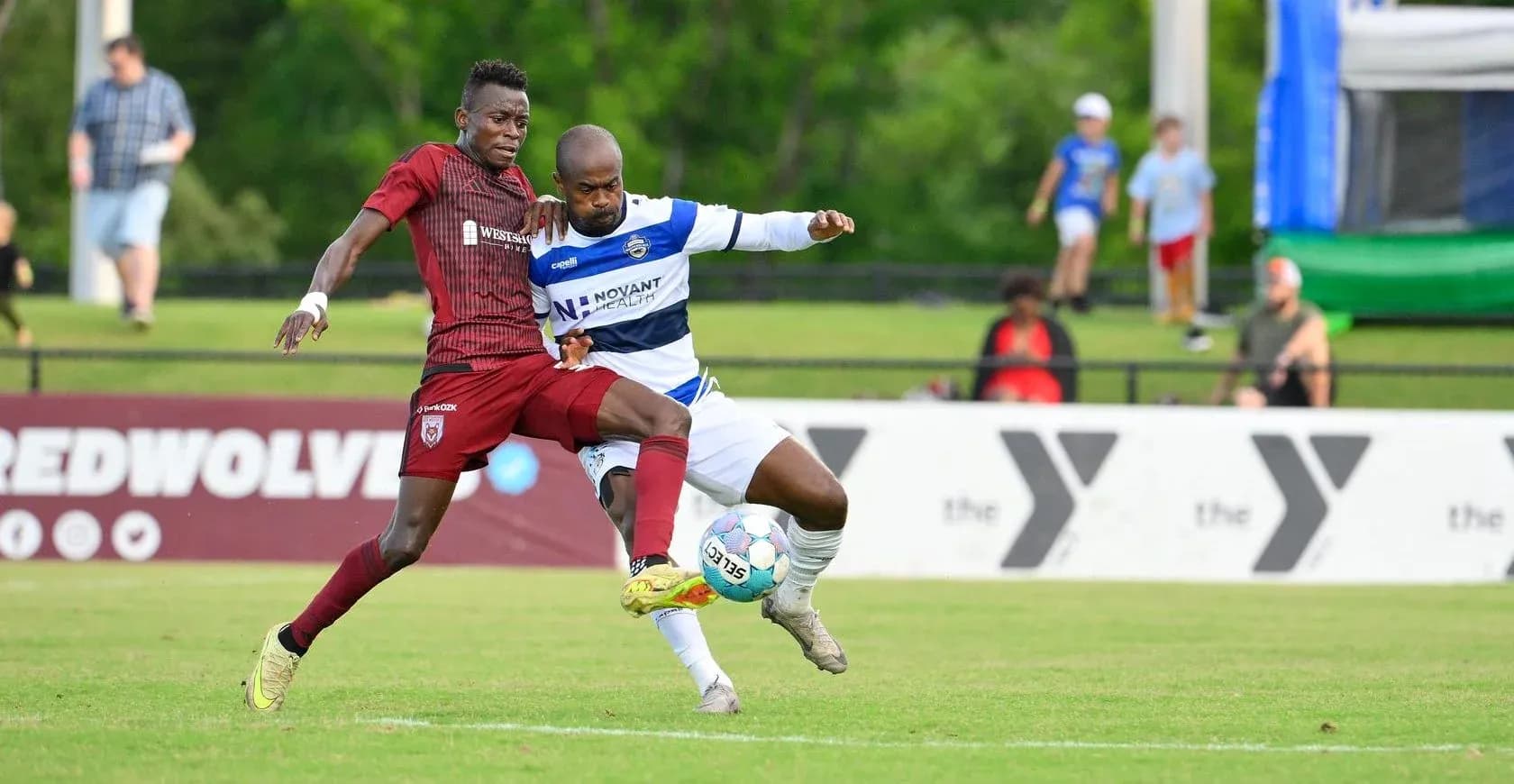 Players contesting the ball during One Knoxville match
