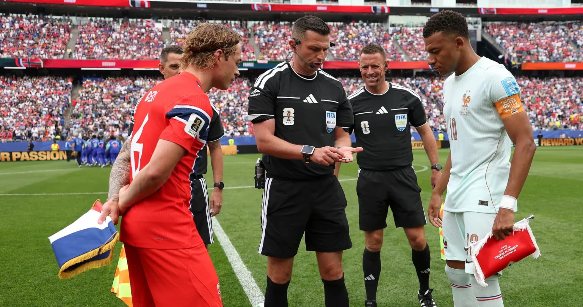 Team captains and referees at coin toss