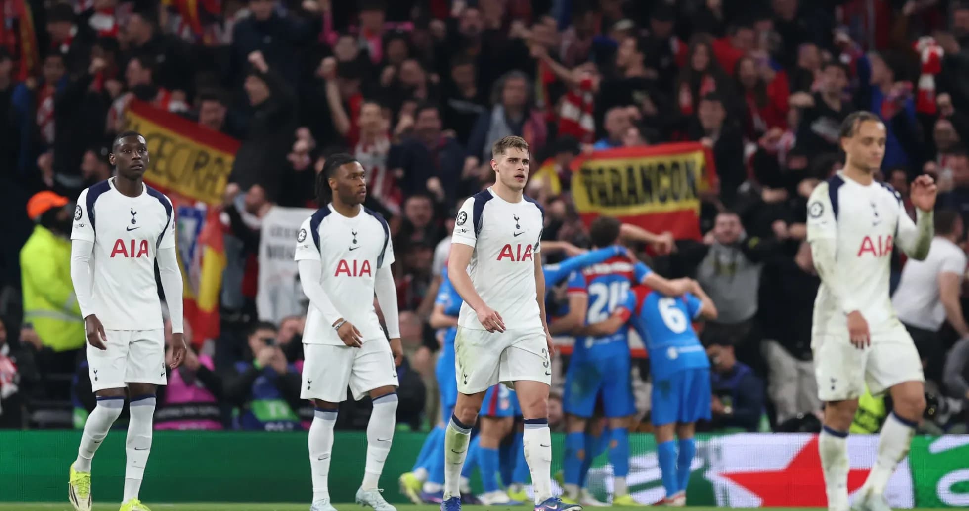 Tottenham players reacting during Champions League match