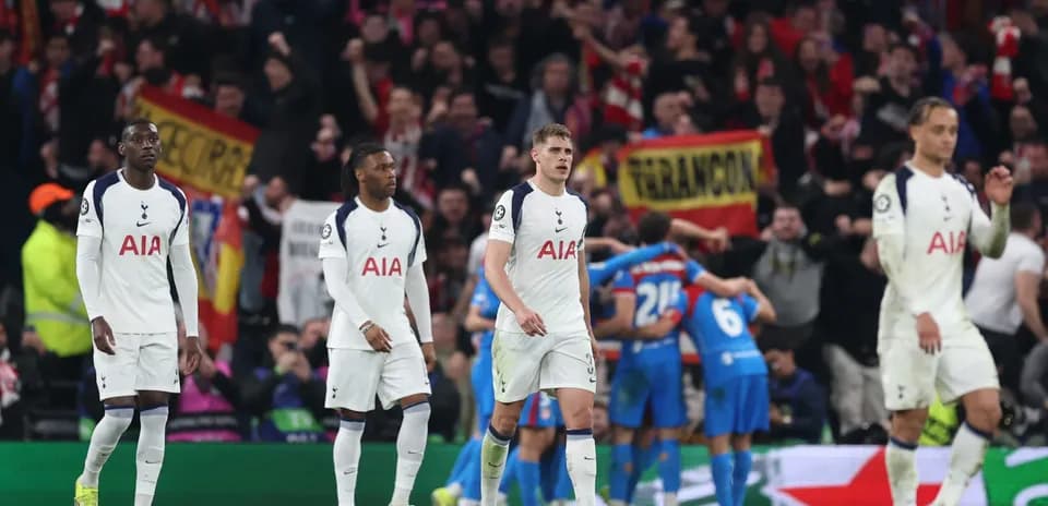 Tottenham players reacting during Champions League match