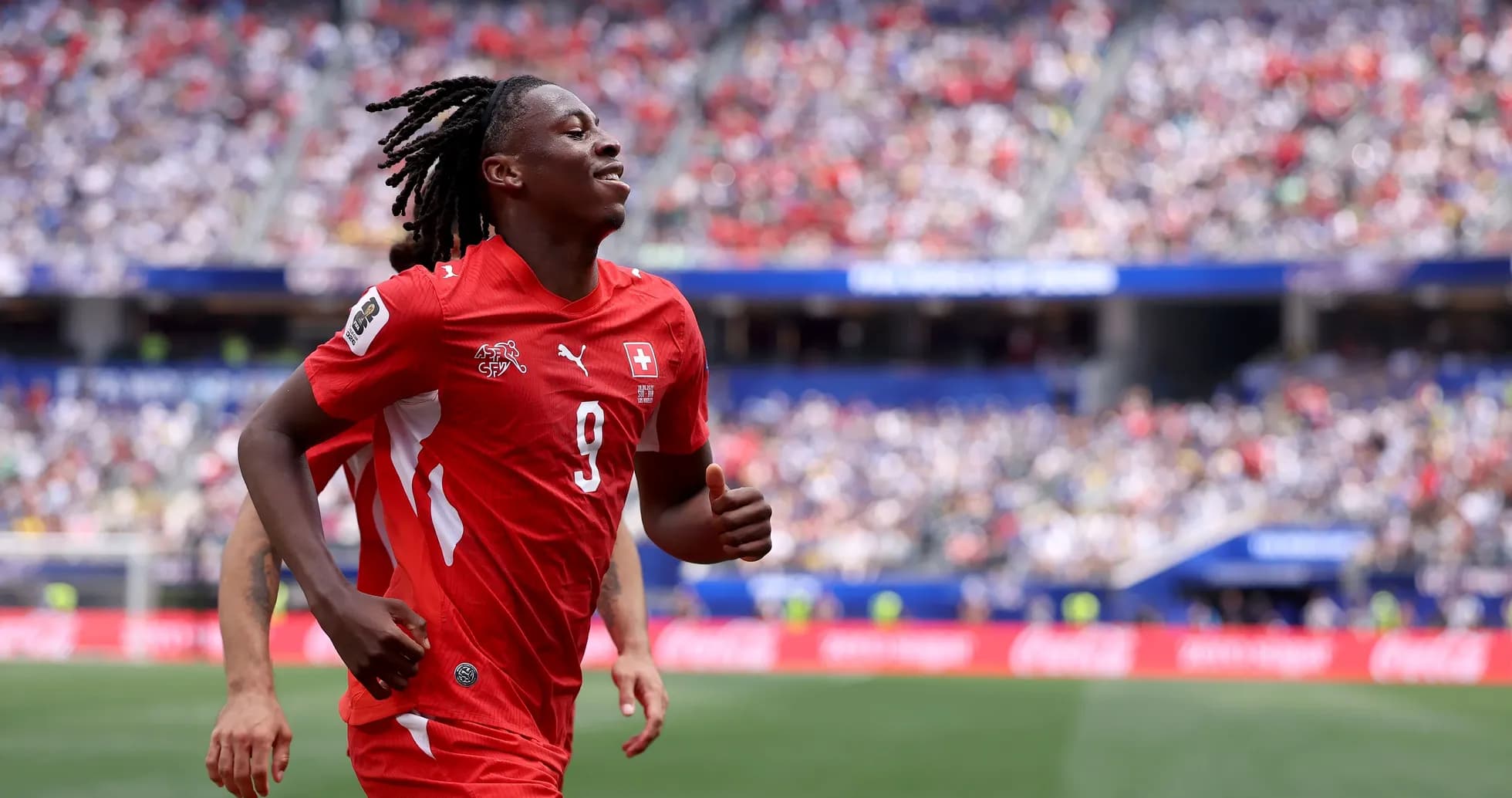 Player celebrating during a football match on field