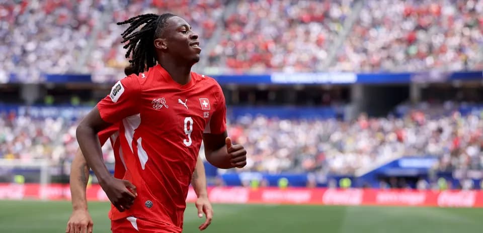 Player celebrating during a football match on field