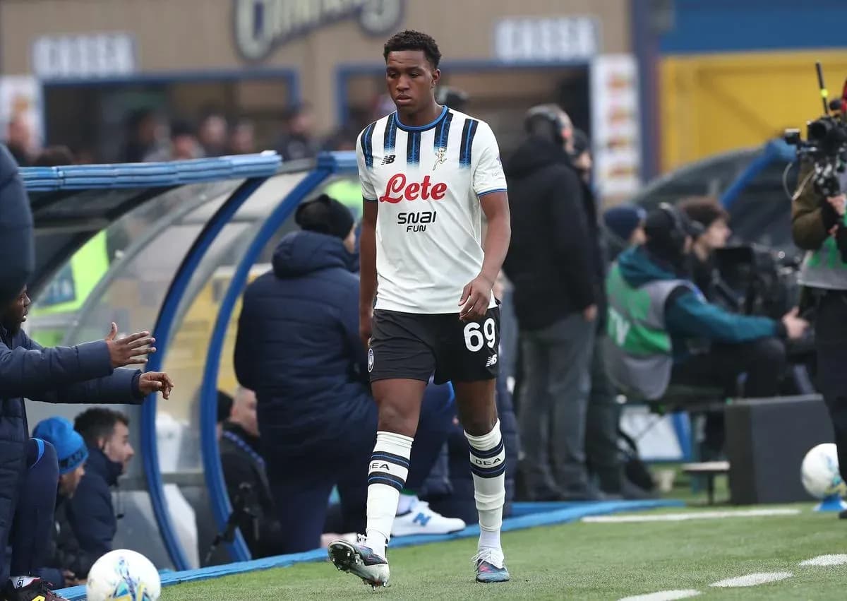 Player walking past the bench during match