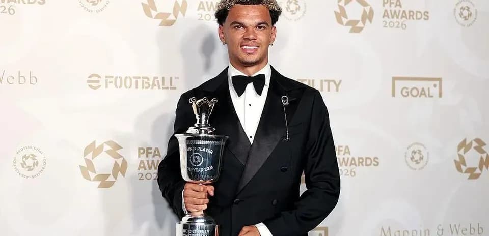 Player holding award at PFA Awards ceremony