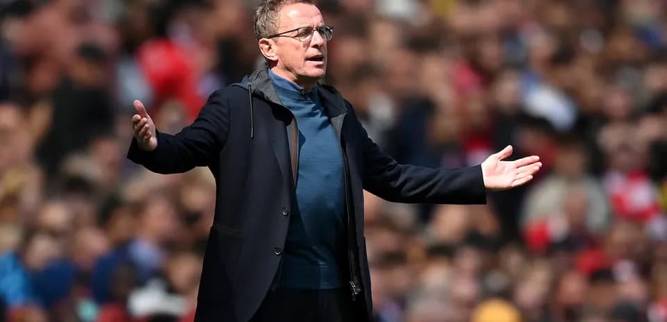 Coach gesturing during match on the sidelines