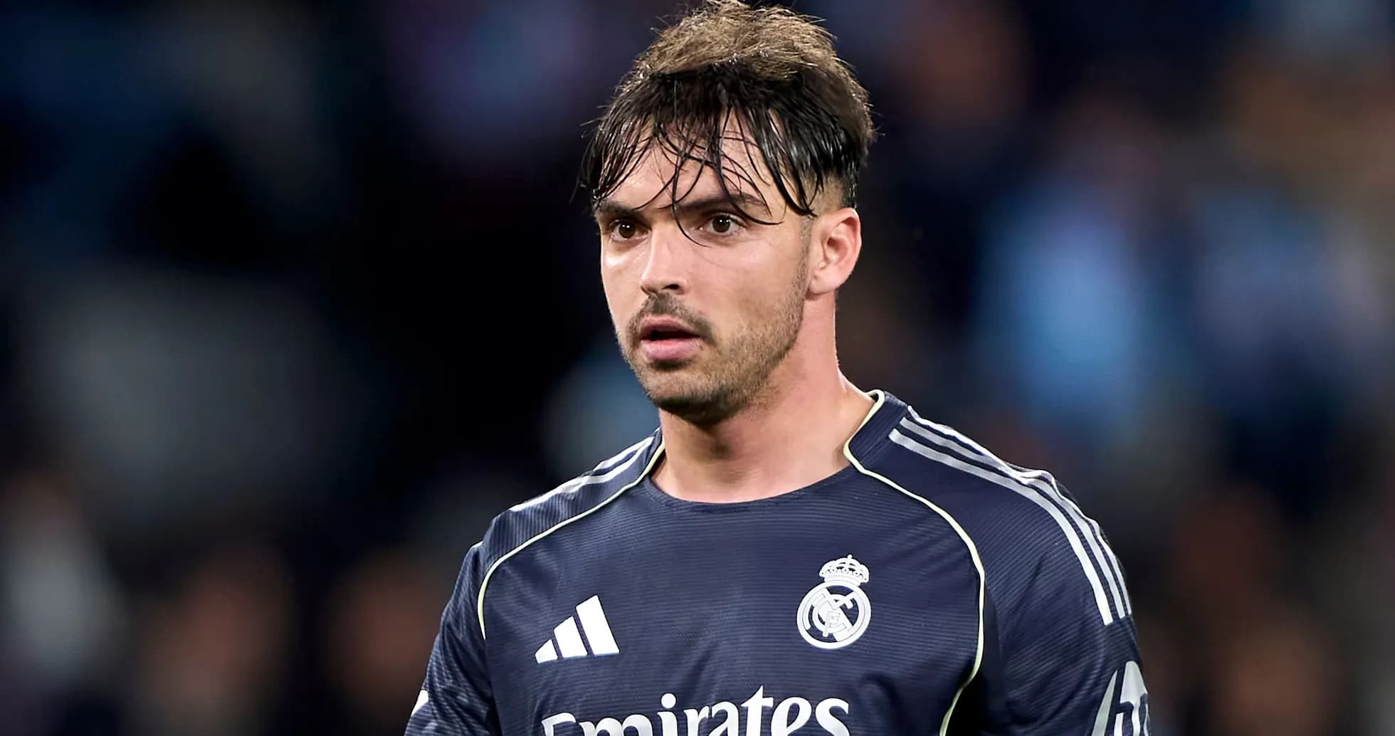 Goalkeeper wearing Real Madrid kit on field