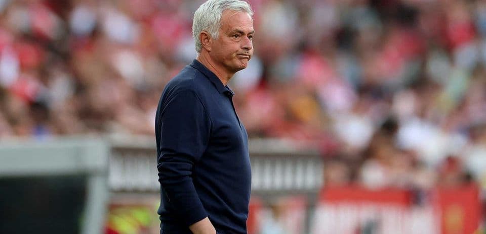 Manager observing the match from the sidelines