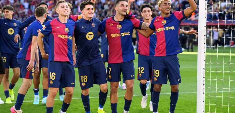 Barcelona players celebrating a goal during match
