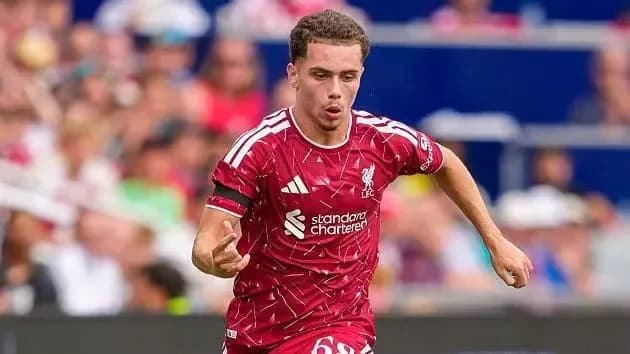 Player running with ball during Liverpool match