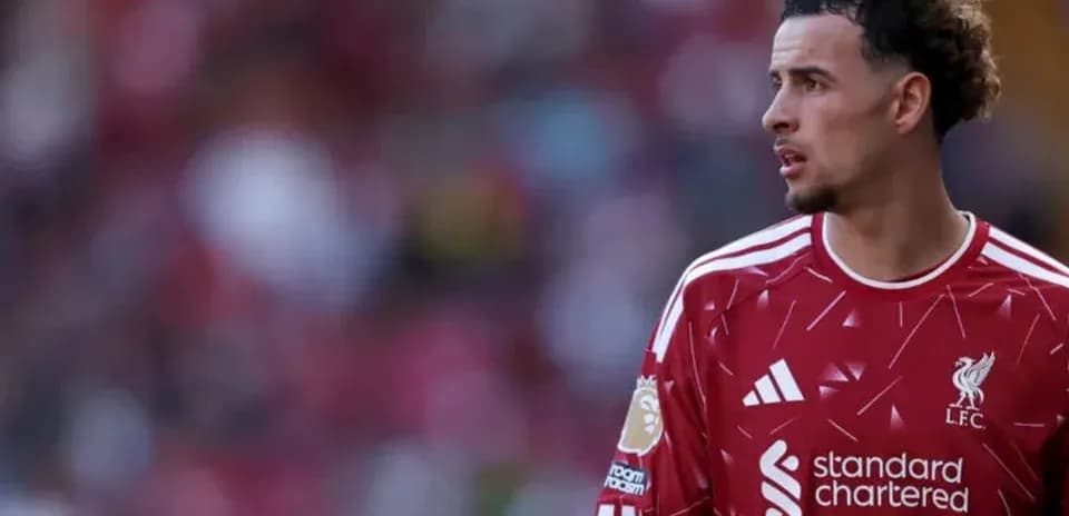 Player wearing Liverpool kit during match