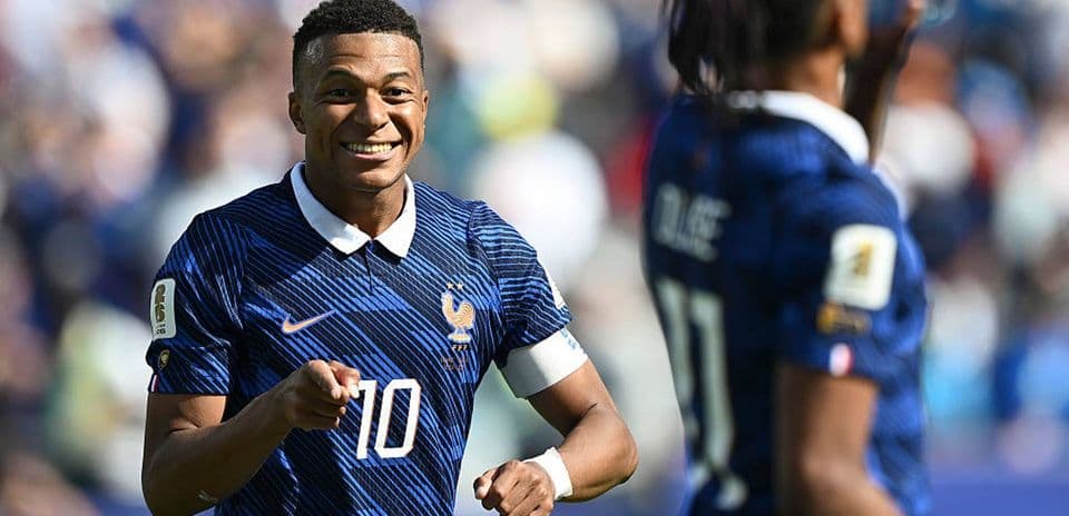 France Triumphs Over Senegal as Mbappé Shatters Scoring Records