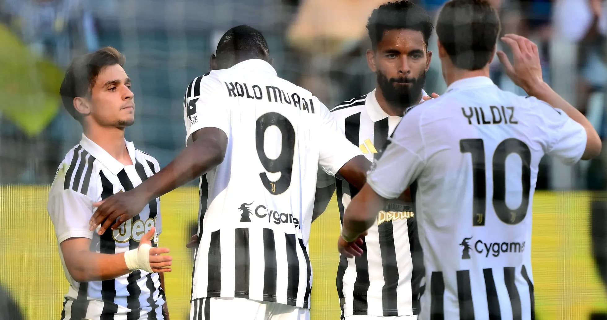 Juventus players celebrating during a match Juventus players celebrating during a match
