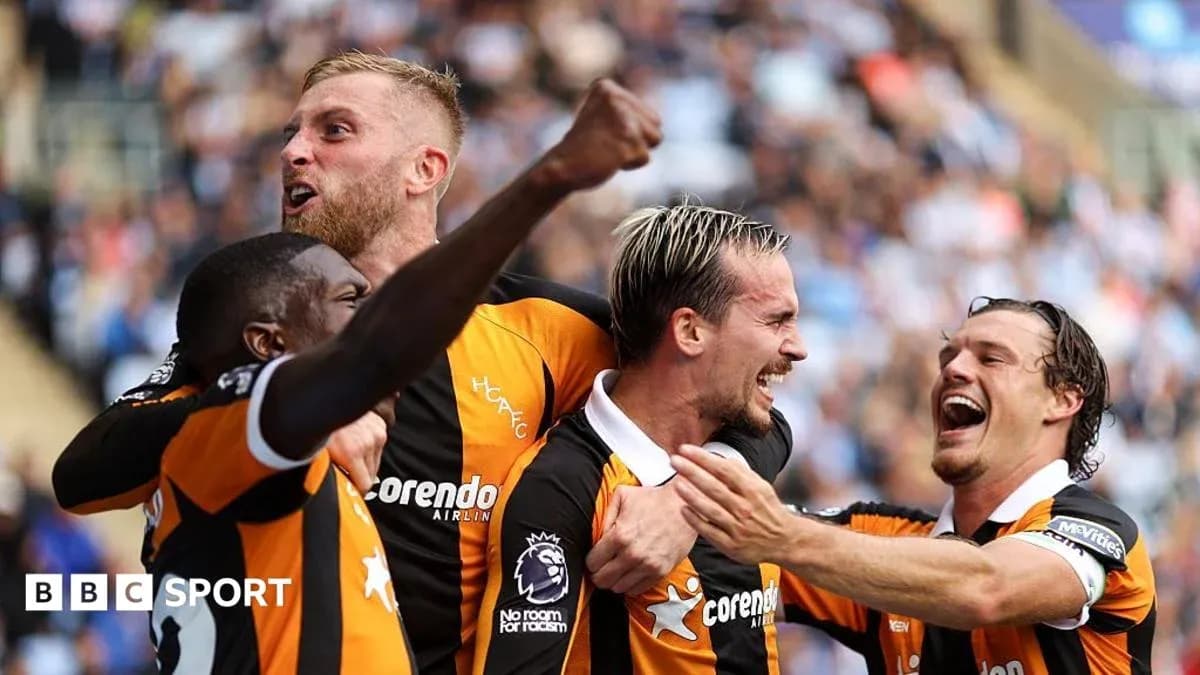 Players celebrating a goal during a match Players celebrating a goal during a match