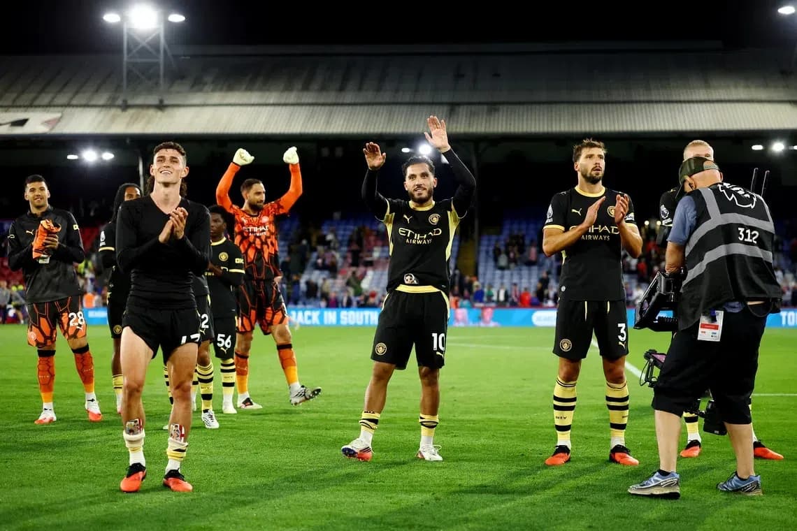 Players applauding fans after the match Players applauding fans after the match