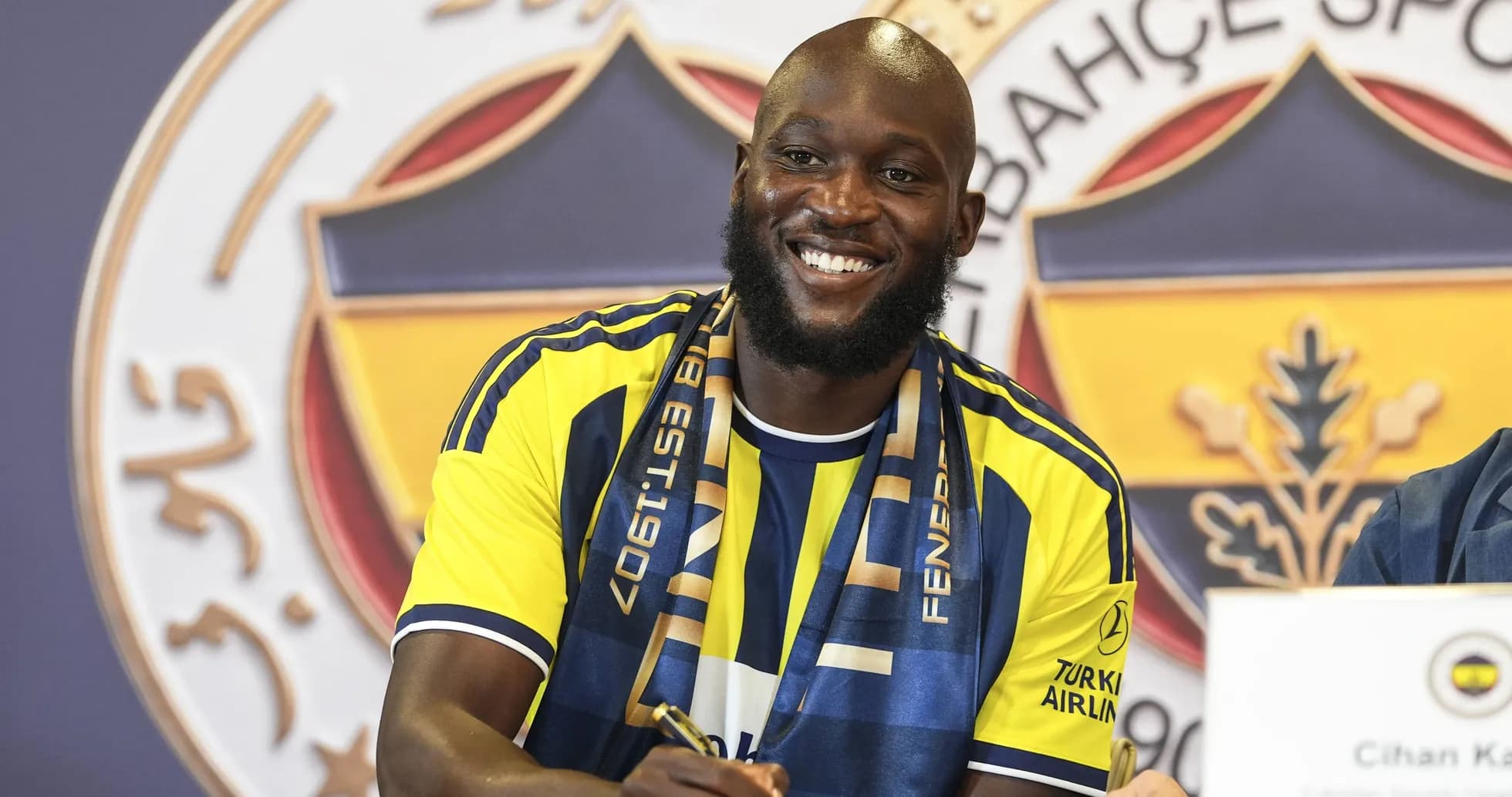 Player signing contract at Fenerbahçe press event Player signing contract at Fenerbahçe press event