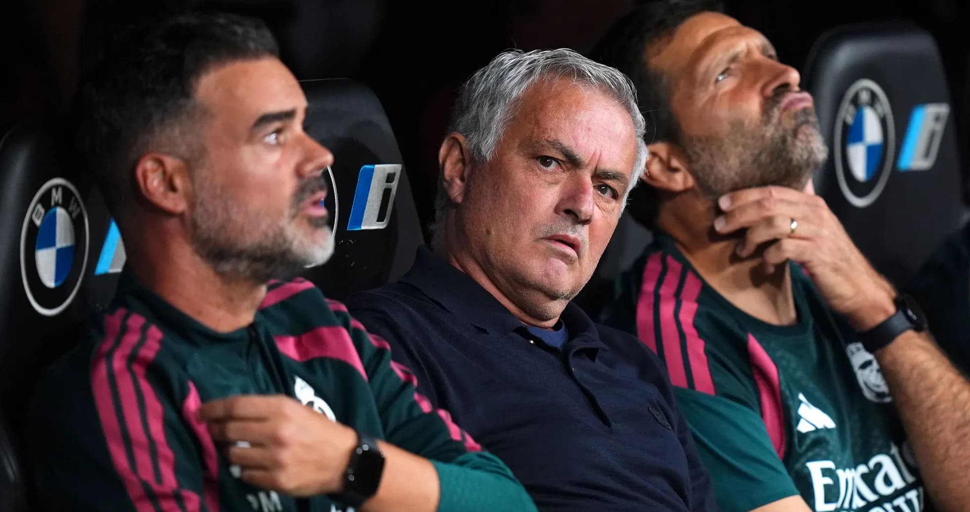 Coaching staff seated on the bench during match Coaching staff seated on the bench during match