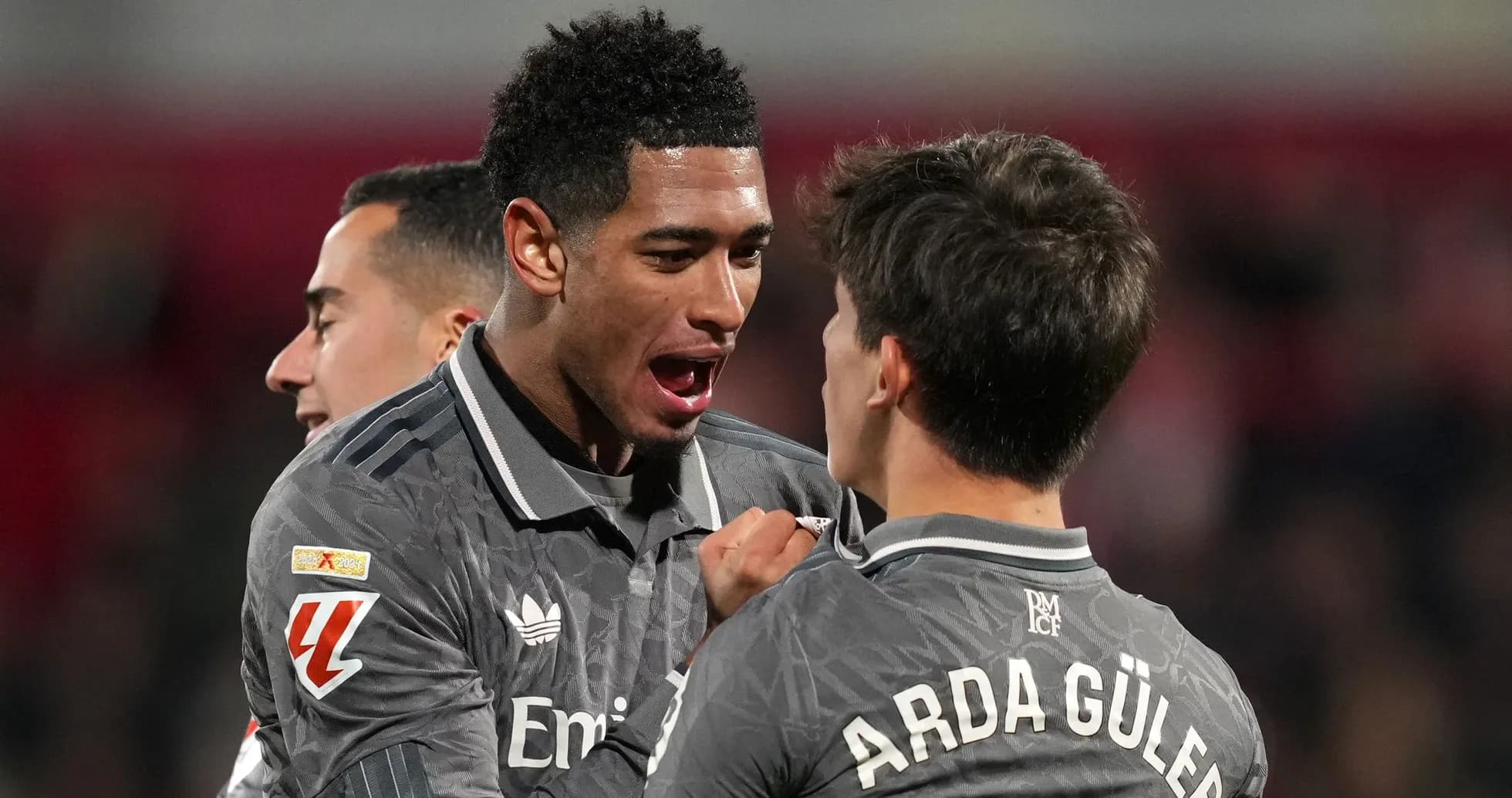 Players celebrating a goal during a match Players celebrating a goal during a match
