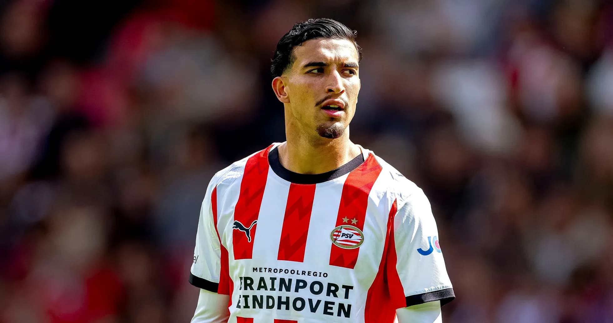 Player in PSV Eindhoven kit during match Player in PSV Eindhoven kit during match