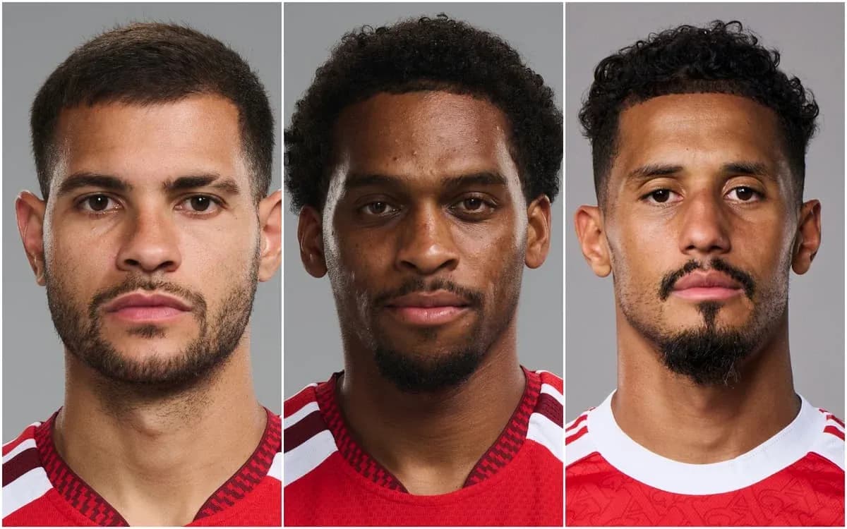 Three soccer players posing for portraits Three soccer players posing for portraits