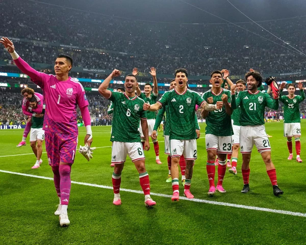 Mexico team celebrating victory at World Cup match Mexico team celebrating victory at World Cup match