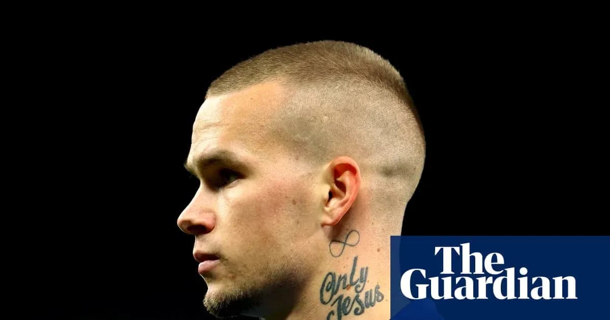 Profile of a player with a buzz cut Profile of a player with a buzz cut