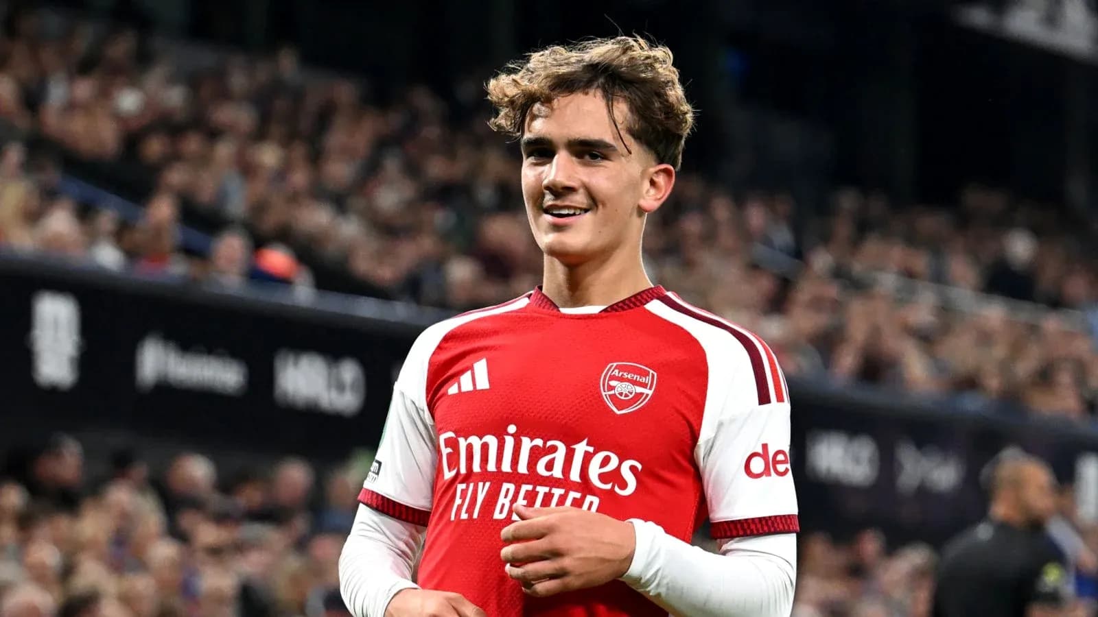 Arsenal player smiling during match celebration Arsenal player smiling during match celebration