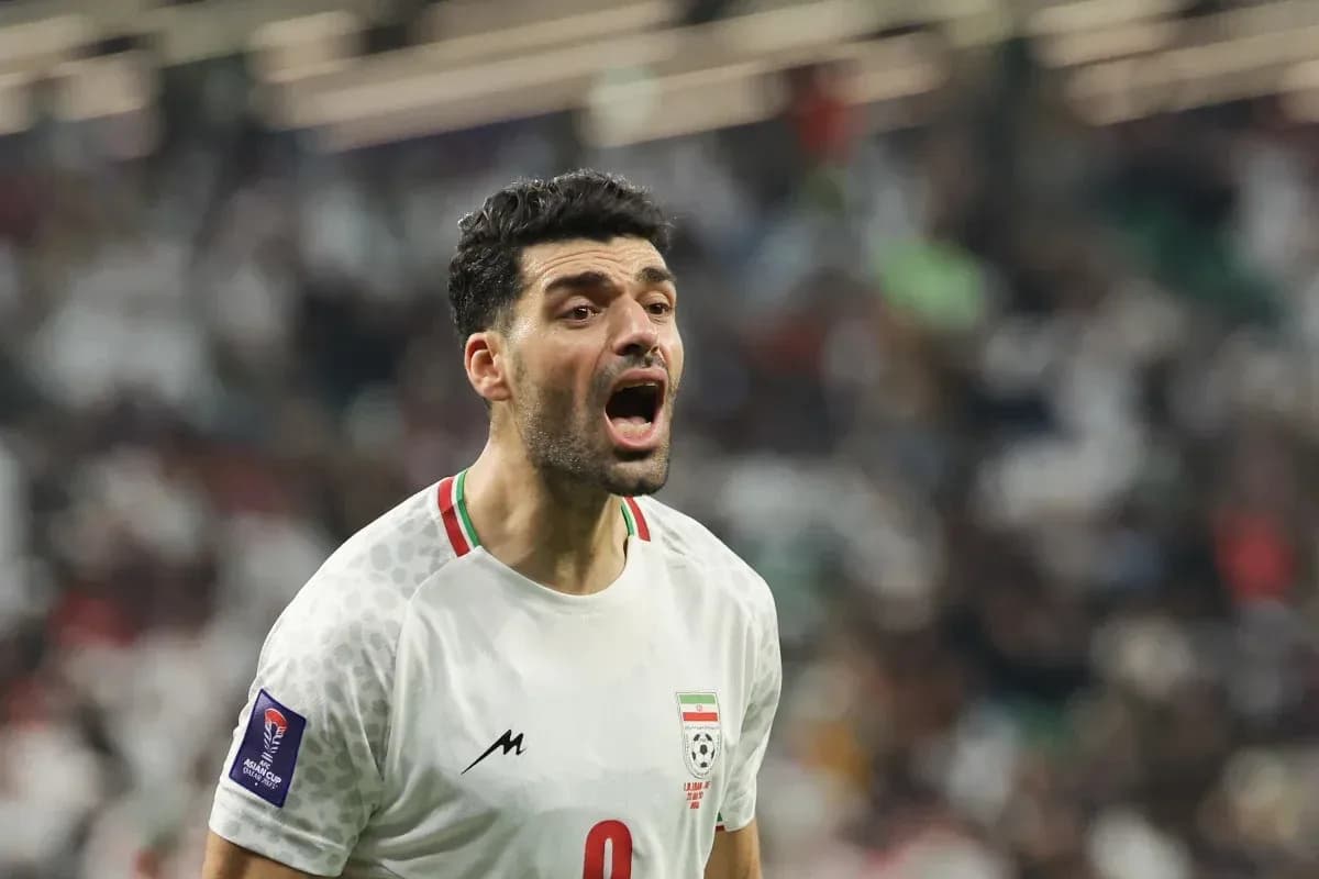 Player shouting during a football match Player shouting during a football match
