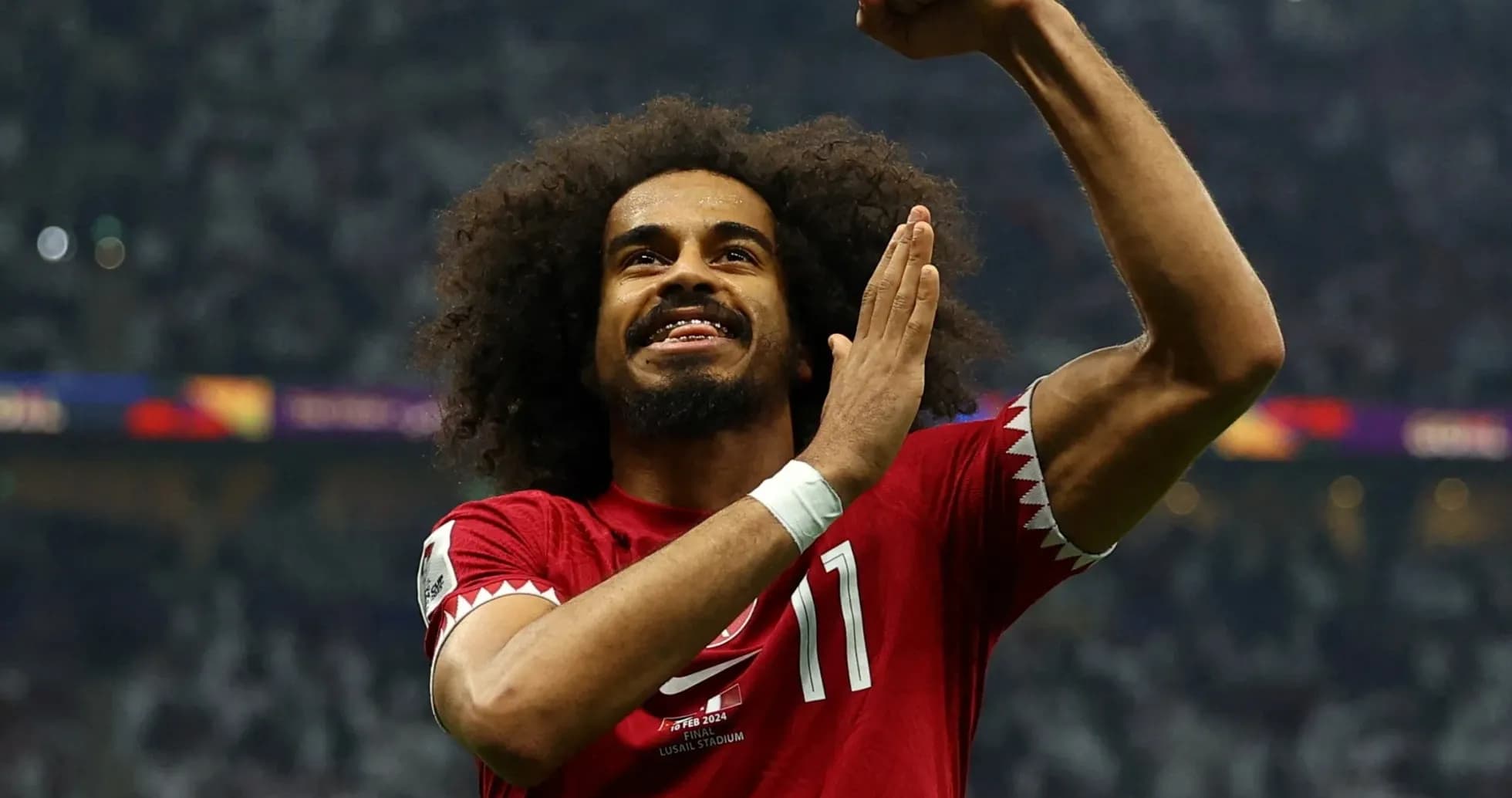 Qatar player celebrating during football match Qatar player celebrating during football match