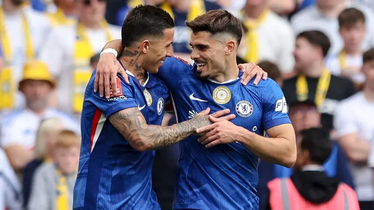 Chelsea players celebrating a goal together Chelsea players celebrating a goal together