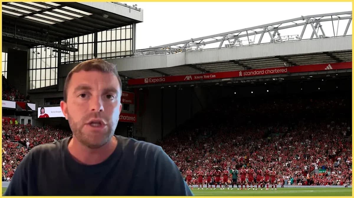 Speaker in front of Liverpool FC crowd at Anfield Speaker in front of Liverpool FC crowd at Anfield
