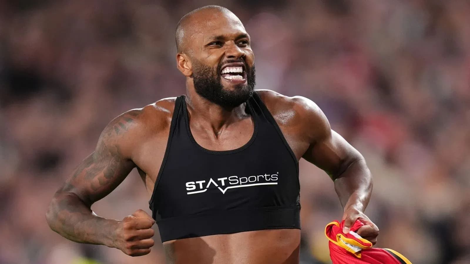 Athlete celebrating during a sports event Athlete celebrating during a sports event