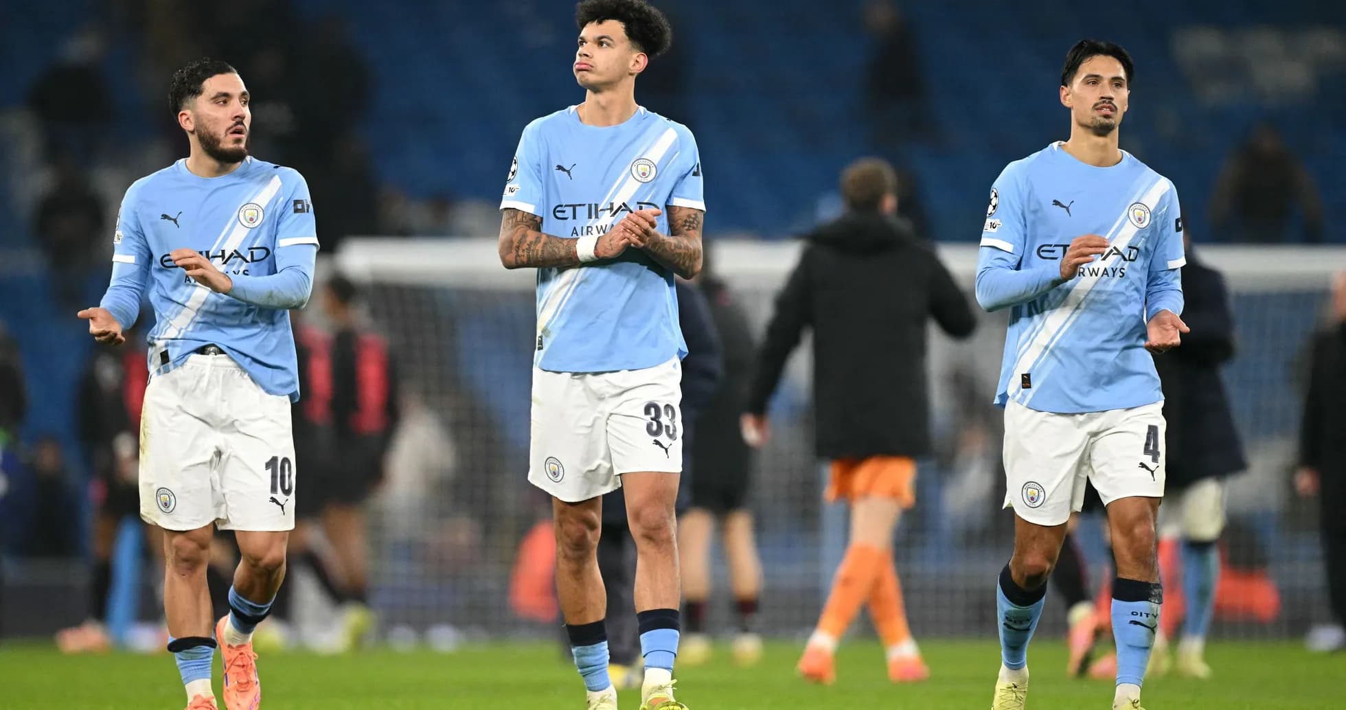 Manchester City players walking off the pitch after match Manchester City players walking off the pitch after match