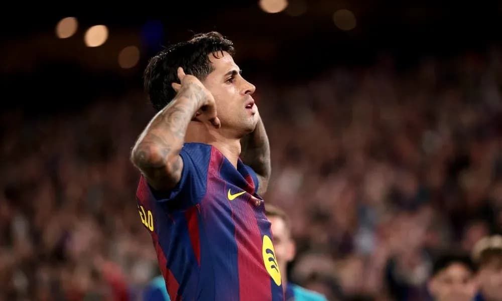 Player celebrating a goal at Camp Nou stadium Player celebrating a goal at Camp Nou stadium