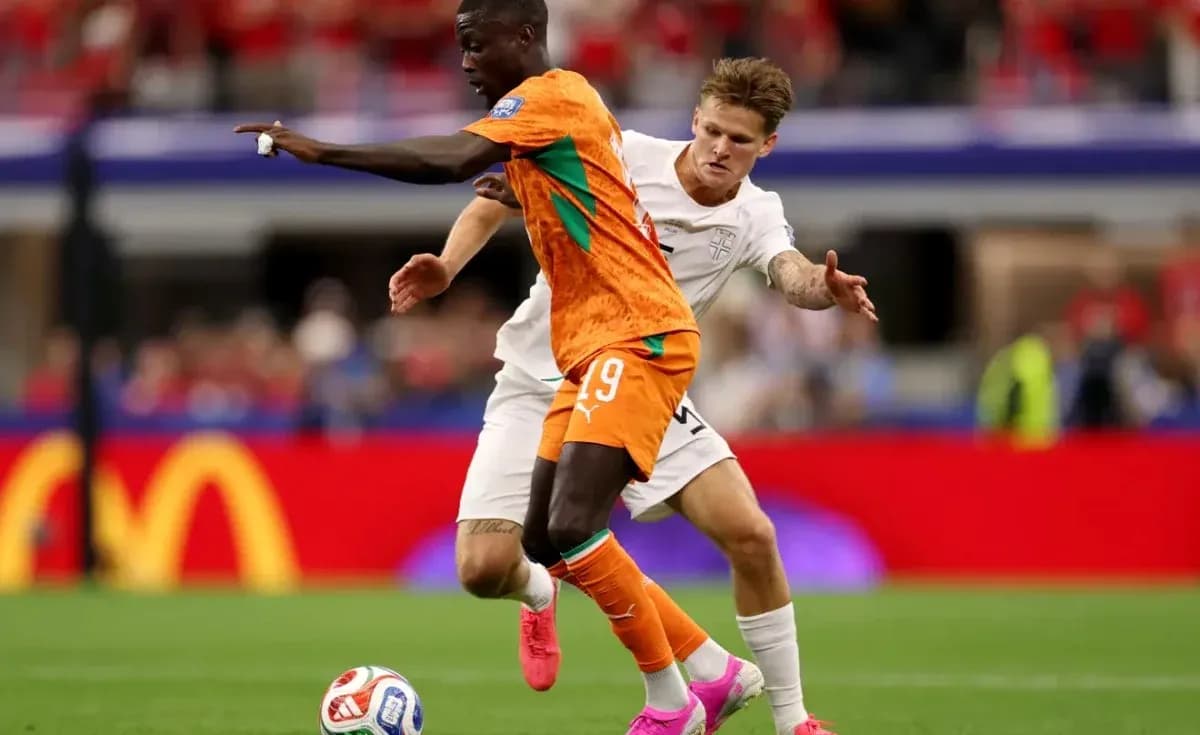 Two players competing for the ball during match Two players competing for the ball during match