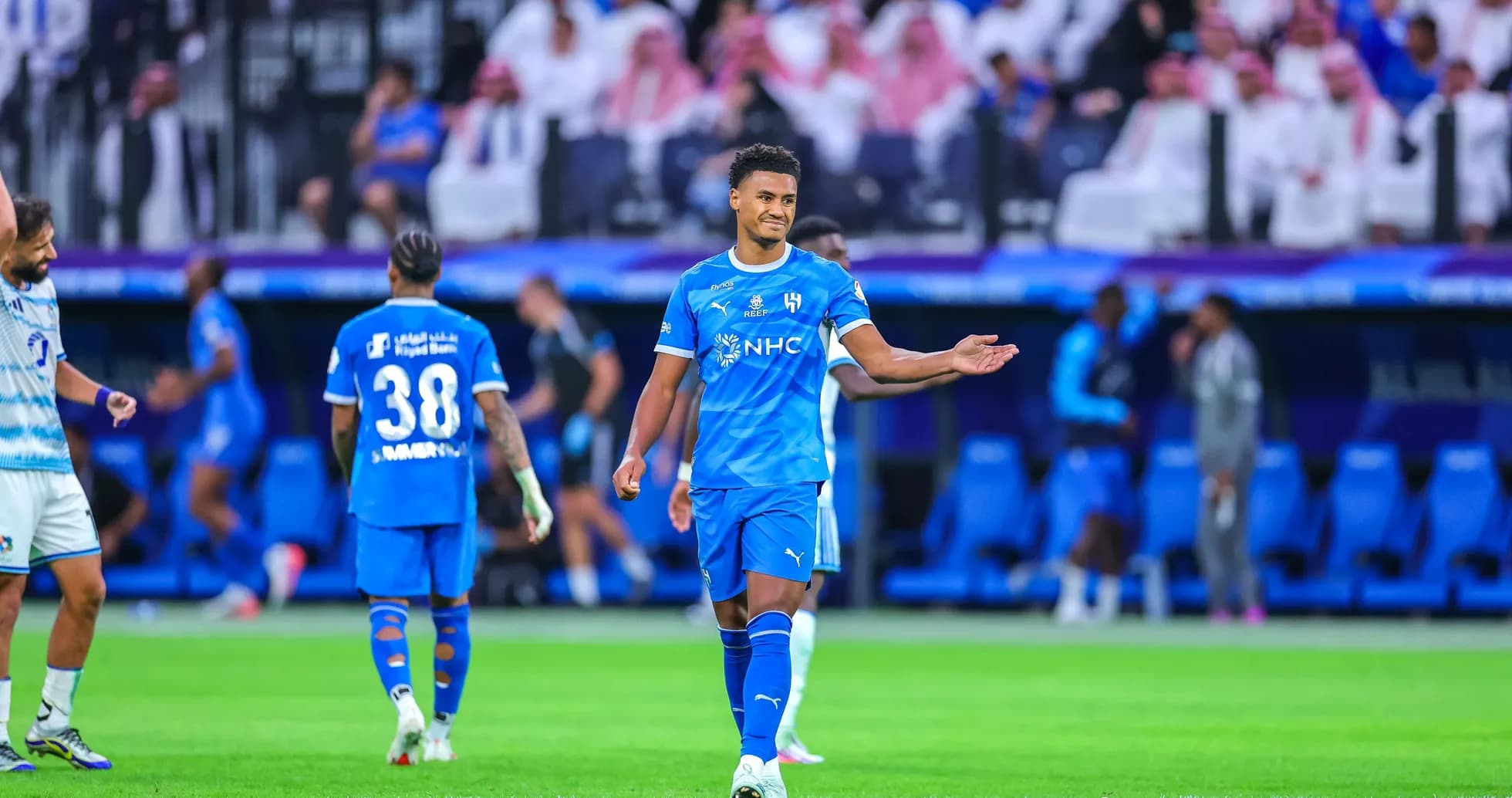 Player gesturing during match at stadium Player gesturing during match at stadium