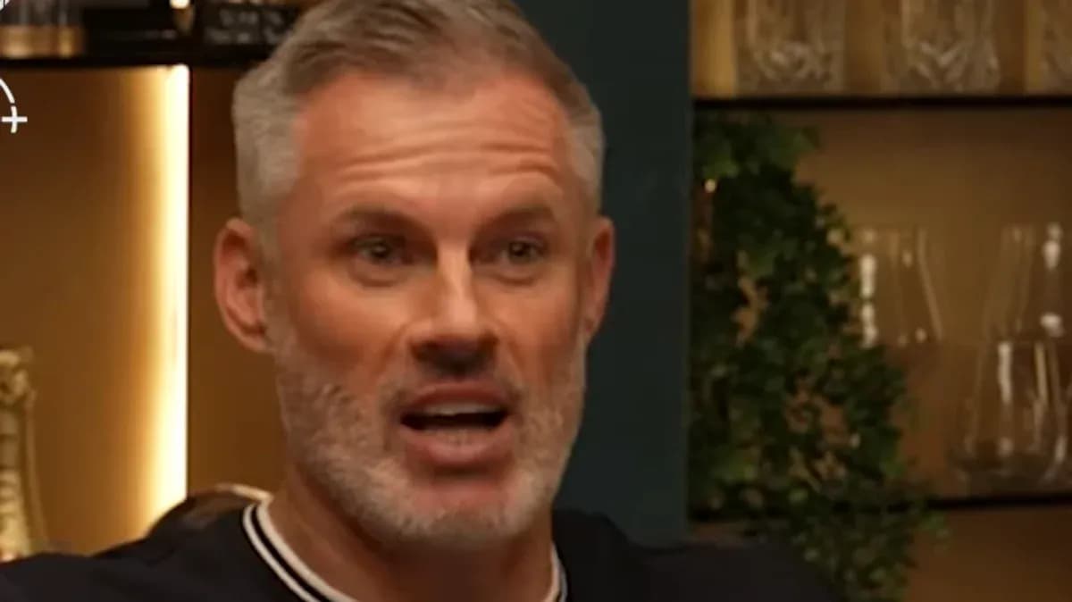 Person speaking during a discussion in a studio Person speaking during a discussion in a studio