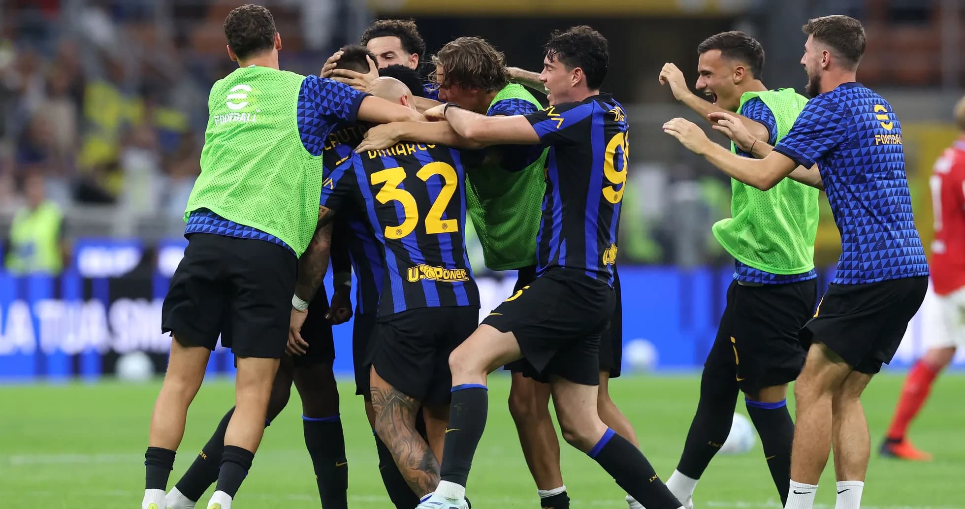 Players celebrating a goal during a match Players celebrating a goal during a match