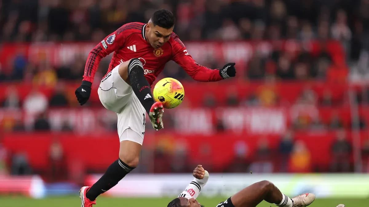 Manchester United player in action against Fulham Manchester United player in action against Fulham