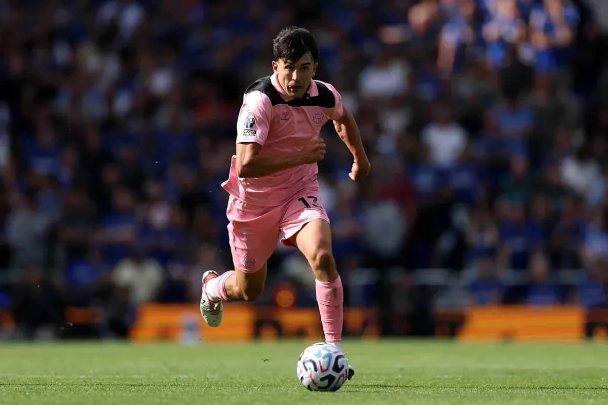 Player running with ball during match action Player running with ball during match action