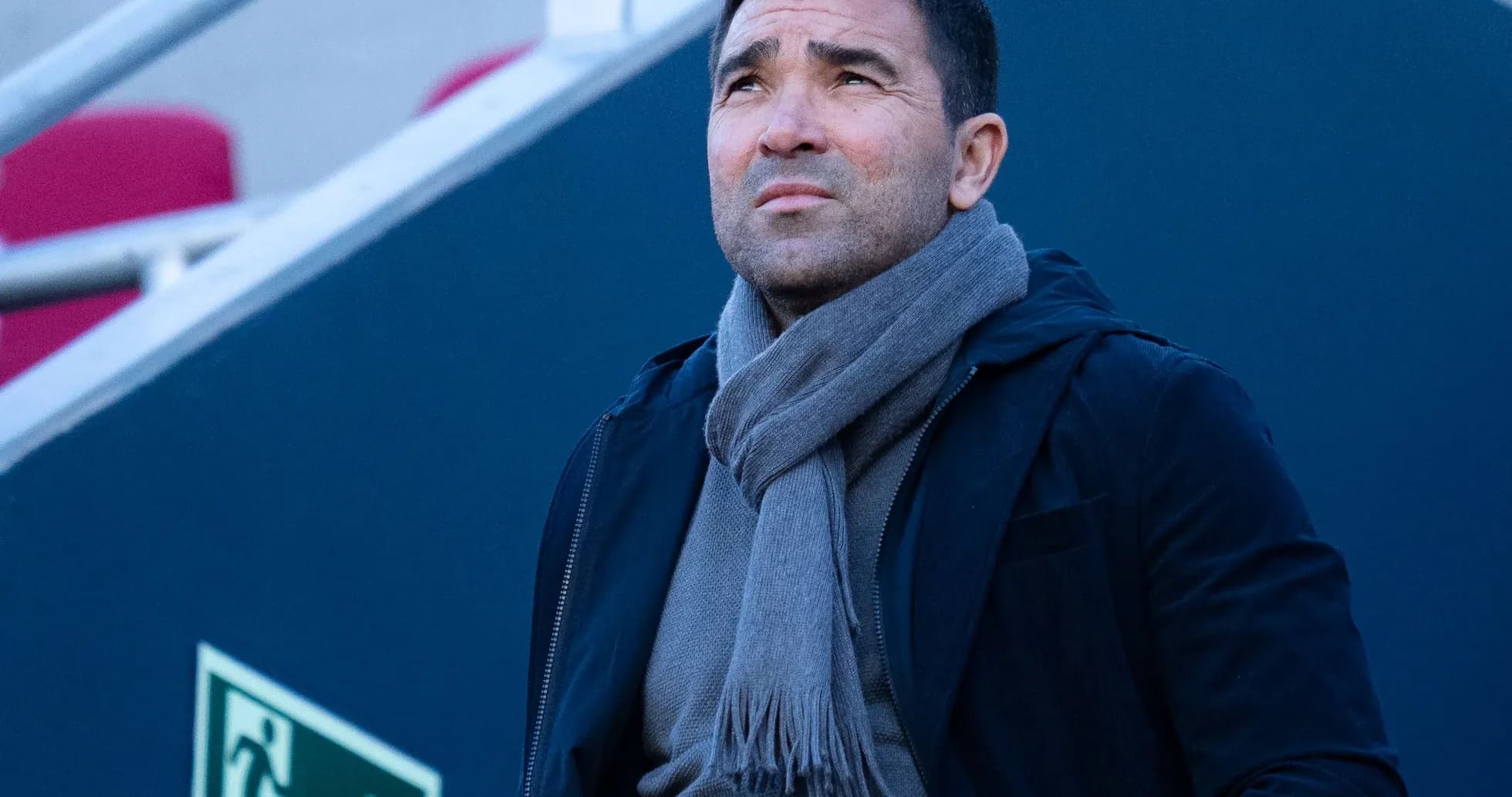 Person wearing a scarf looking up thoughtfully Person wearing a scarf looking up thoughtfully