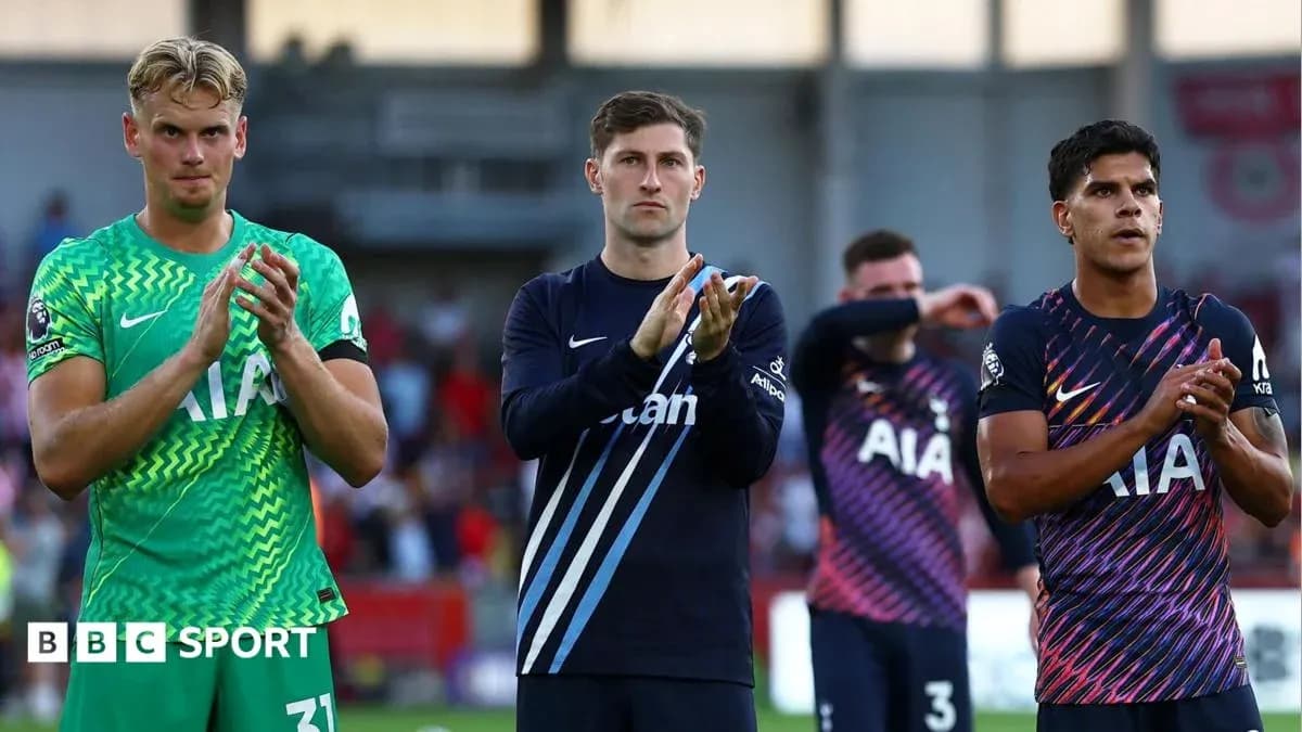 Three players applauding fans after a match Three players applauding fans after a match