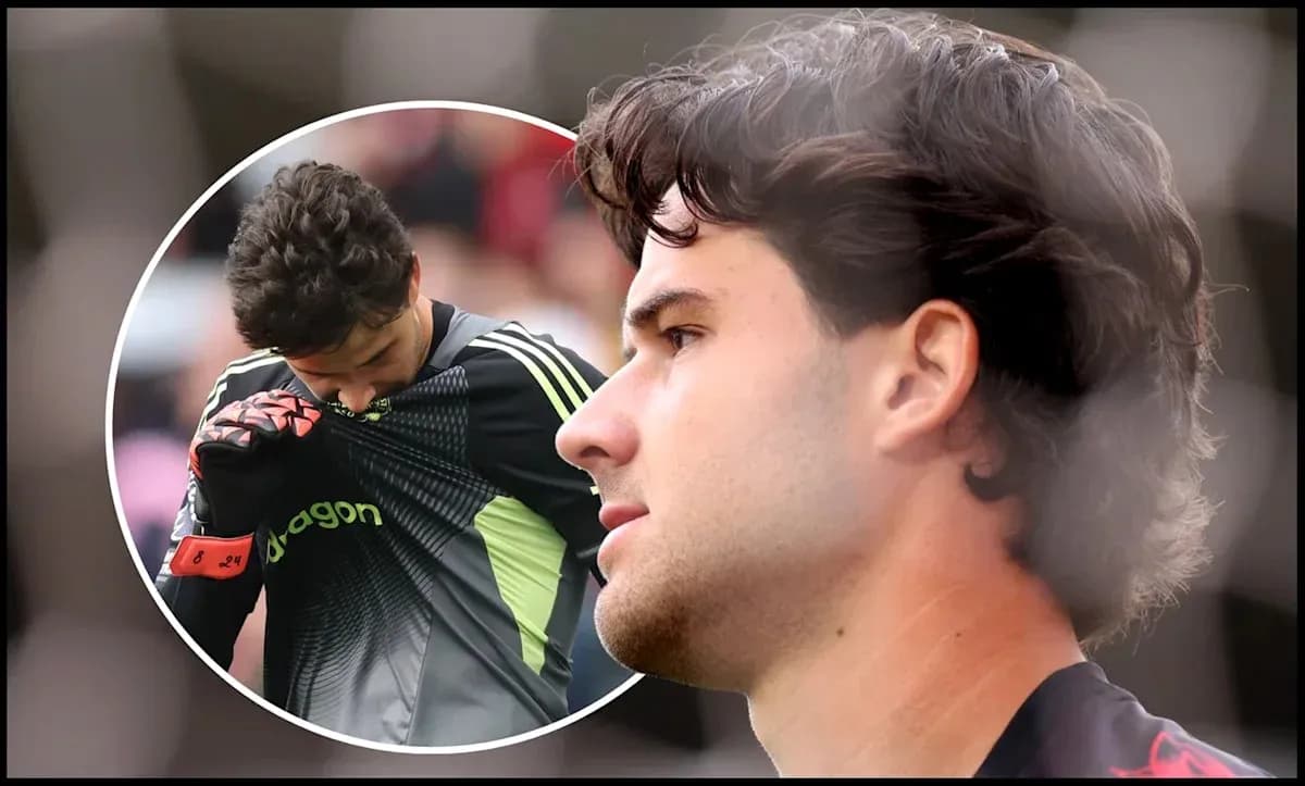 Goalkeeper adjusting shirt during match preparation Goalkeeper adjusting shirt during match preparation