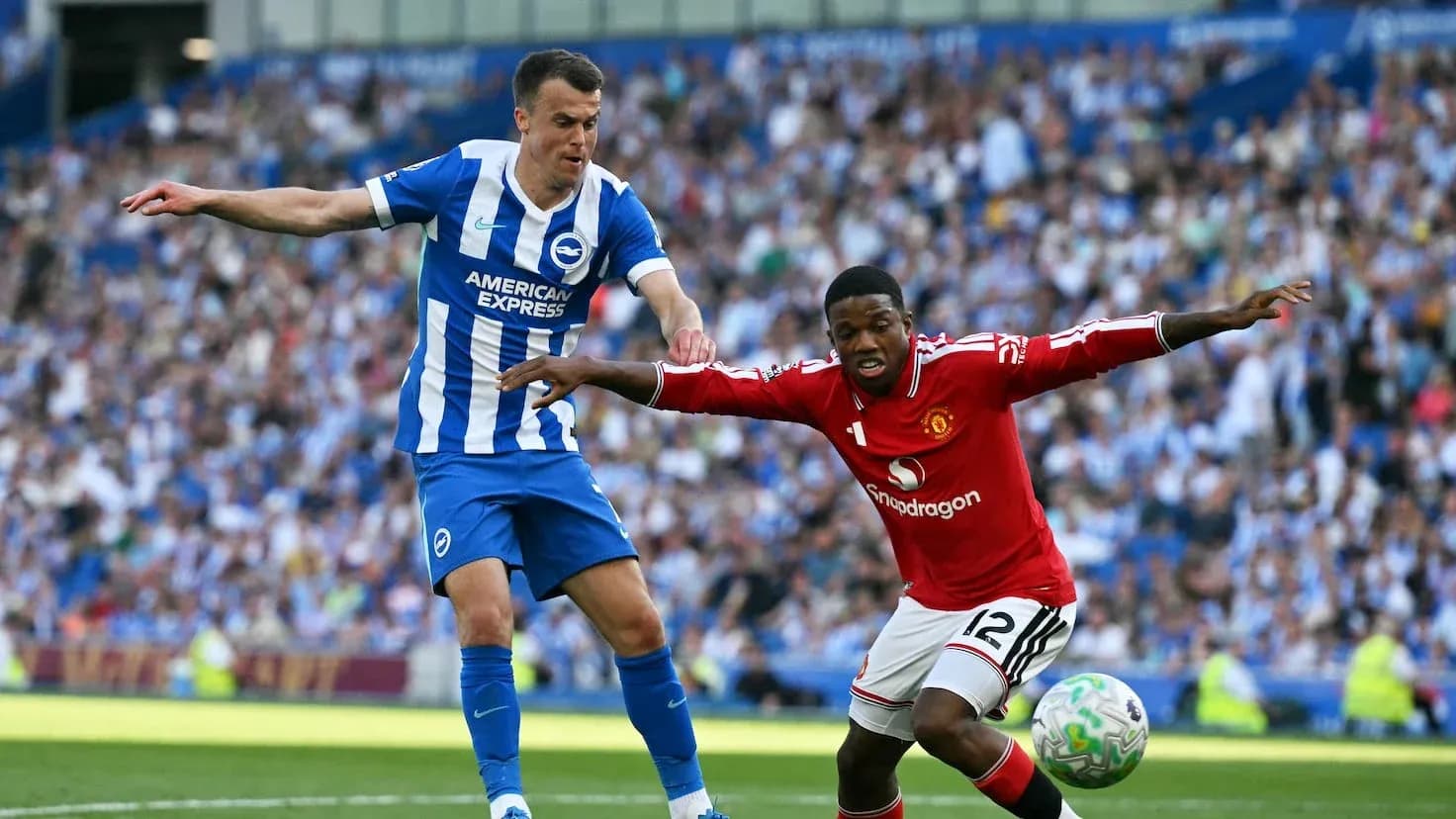 Brighton player challenges Manchester United opponent Brighton player challenges Manchester United opponent