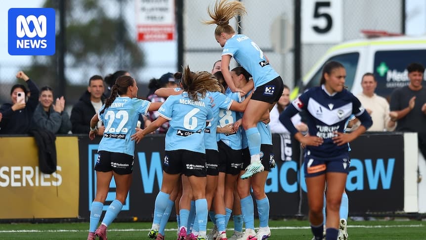 Players celebrating a goal during a match Players celebrating a goal during a match